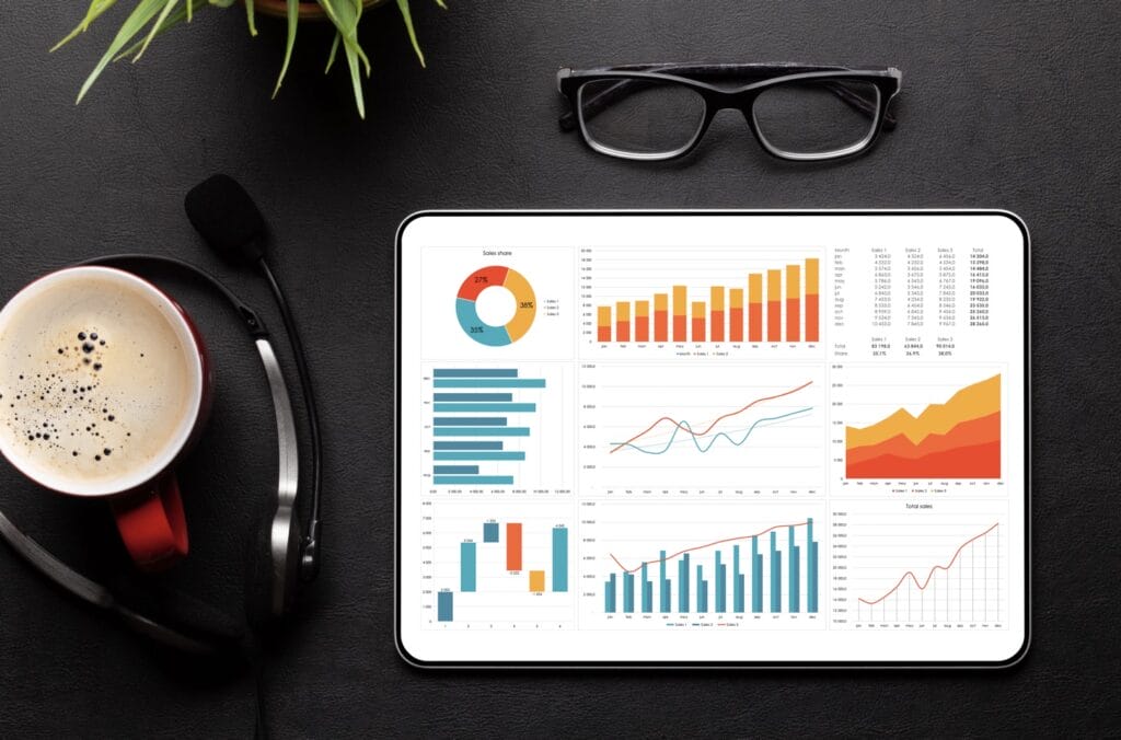 Tablet With Business Reports And Charts