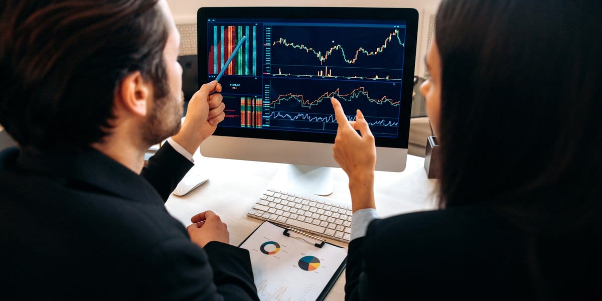Professionals Analyzing Data Charts Screen
